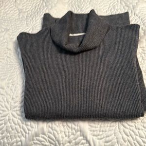 Gray turtleneck.